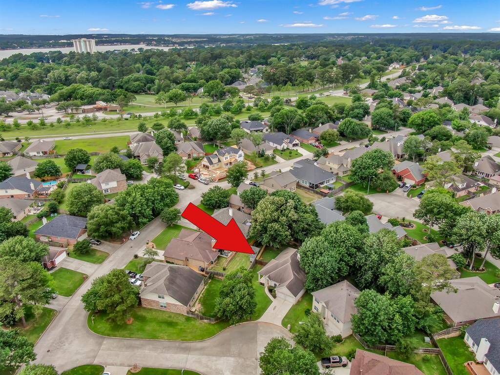 The nearby Margaritaville can be seen in the background on Lake Conroe.