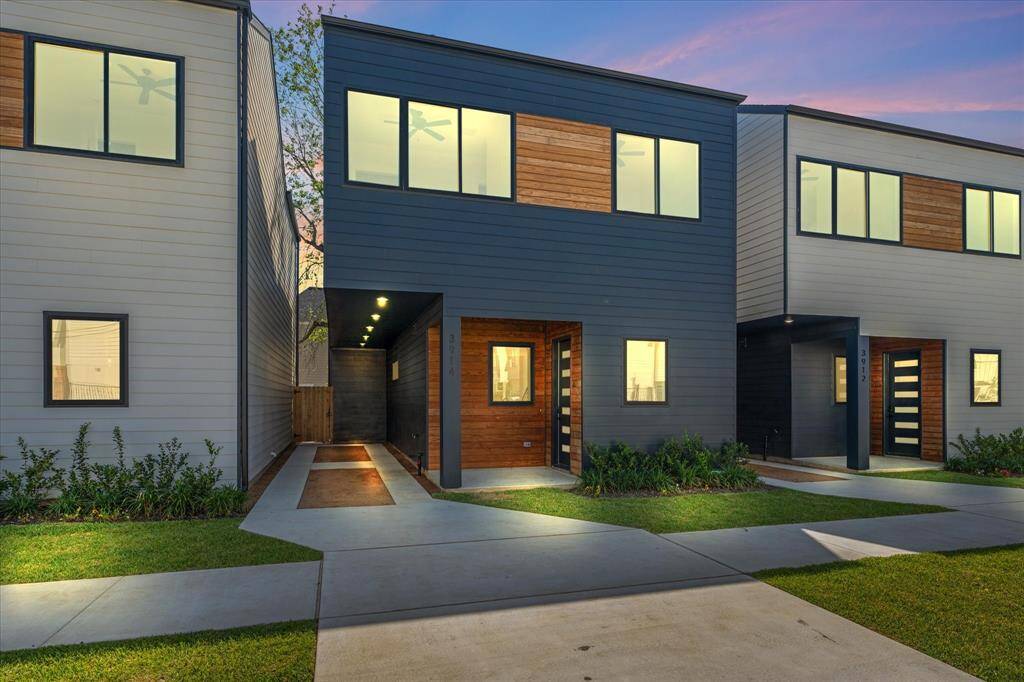 Exterior: All 3 homes. Subject property in the middle