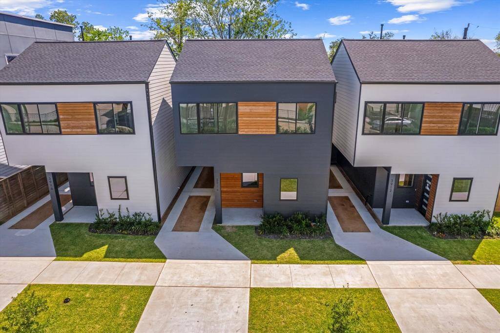 Exterior: All 3 homes. Subject property in the middle