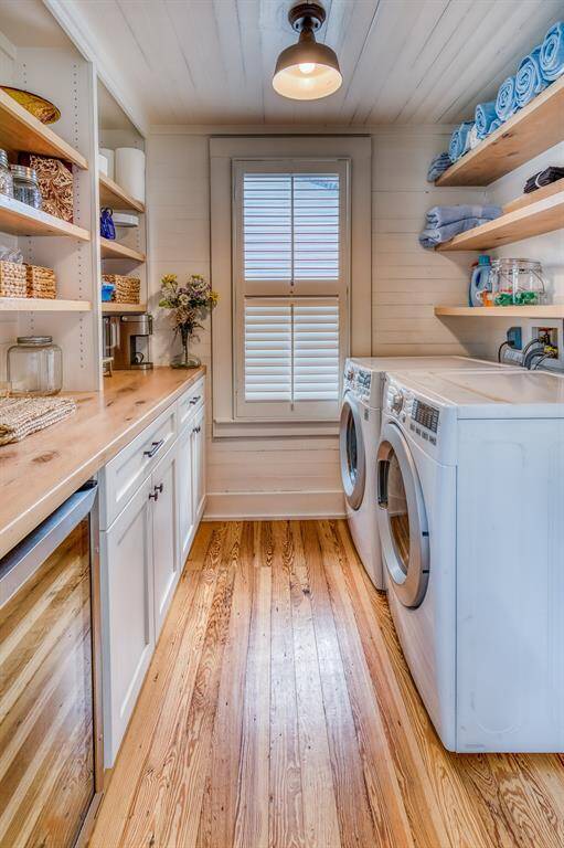 This multifunctional utility room is a quiet workhorse—outfitted with custom cabinetry, butcher-block counters, and plenty of natural light.