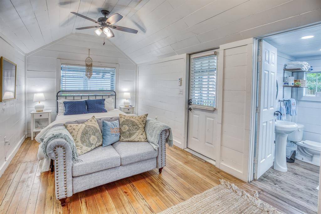 Welcome to the Garden Suite, a bright and inviting guest suite offering comfort and charm with its soft color palette, cozy seating area, and en suite bath—perfect for a restful retreat after a day of exploring.