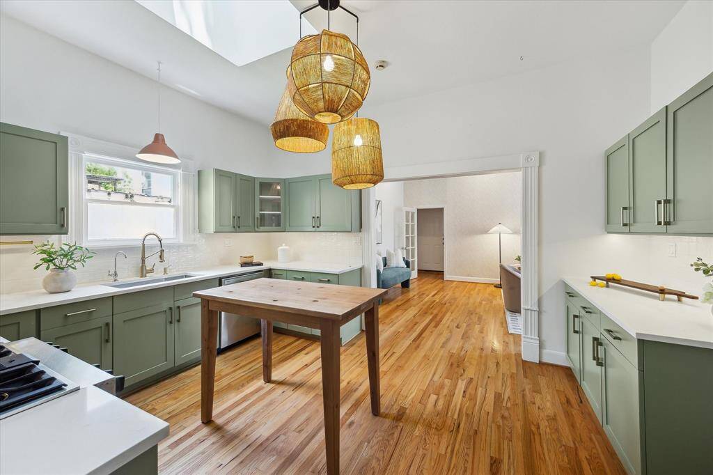 Kitchen (15 X 12) was remodeled in 2024. Updates include Caesarstone quartz counter tops, painted cabinetry, tile backsplash, Dakota stainless steel under mount sink and more.