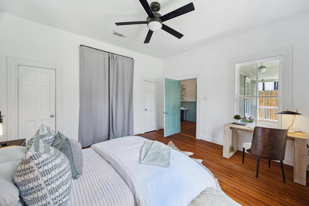 Another view of first secondary bedroom. Windows to front yard and front patio. Wonder natural light and a cozy ambiance!