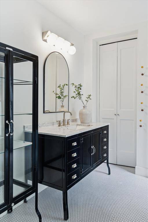 Close up of Restoration Hardware vanity. Linen closet behind for additional storage