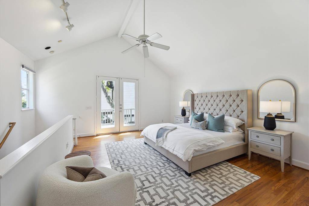 Primary suite located on second floor. Vaulted ceilings, private balcony, large walk-in closet with hanging space