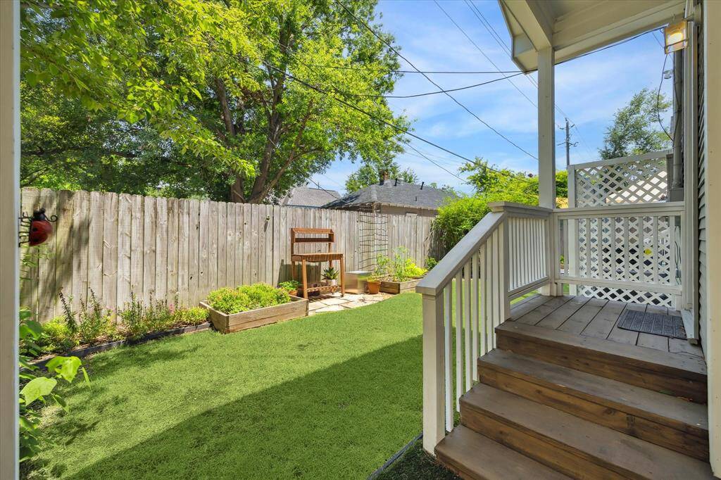 Separate entrance that leads to staircase to primary suite and den