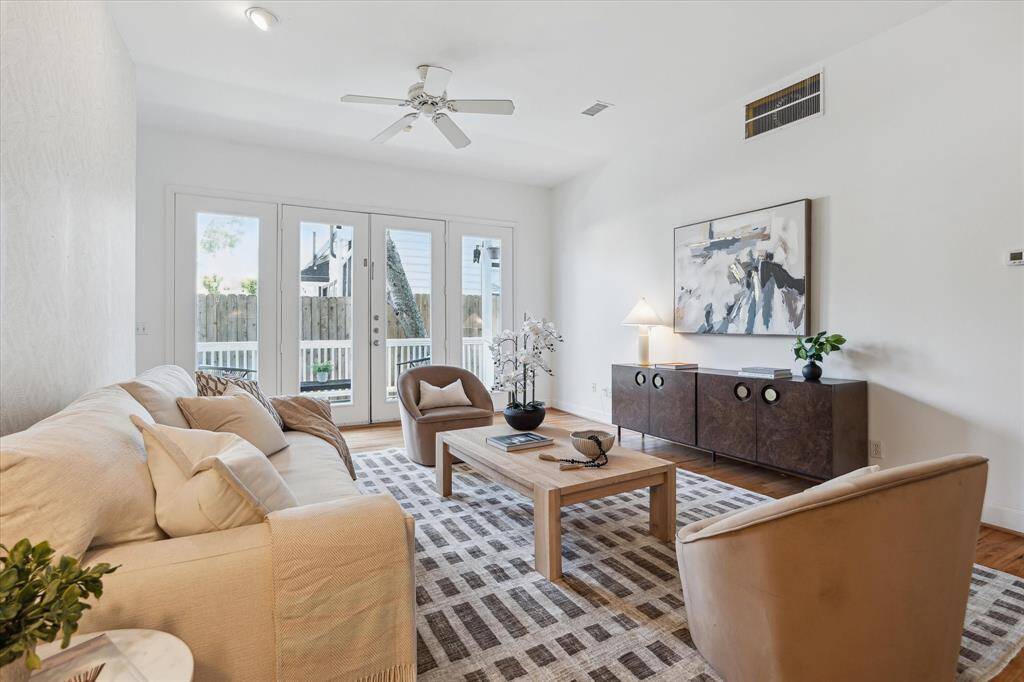 Den (21 X 20) located off kitchen. French doors to covered patio. Two ceiling fans and recessed lighting.