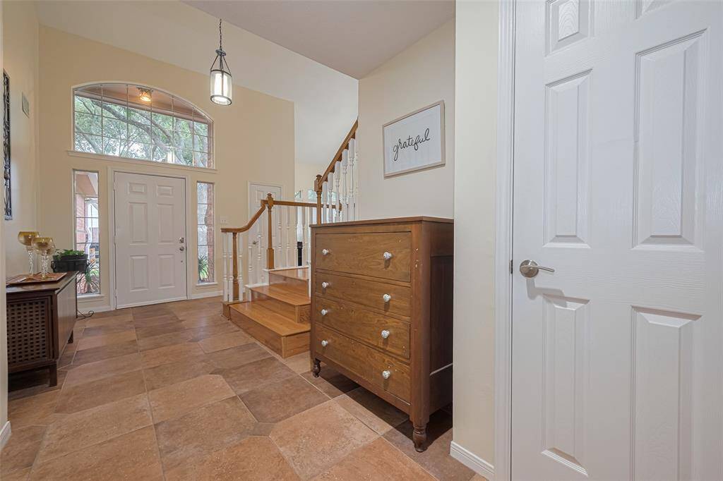 Hardwood staircase to 2nd floor