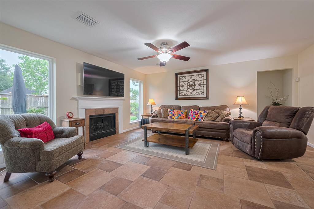 Spacious living room with gas-log fireplace
