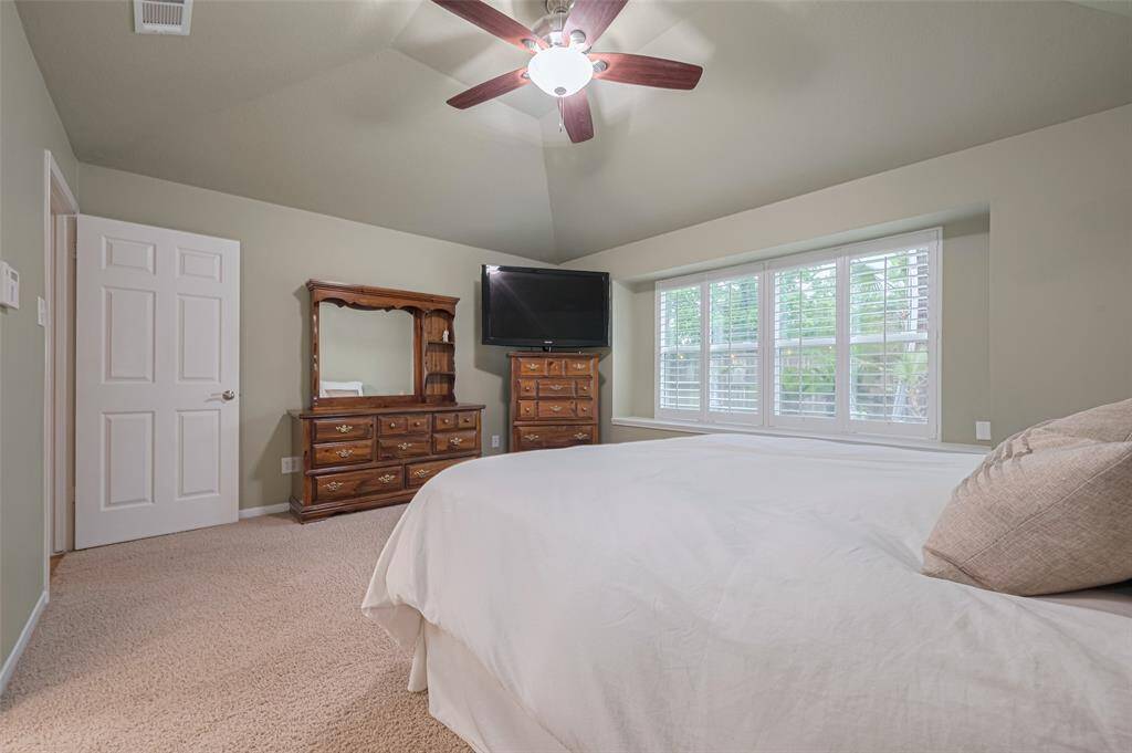 Plantation shutters in the primary suite