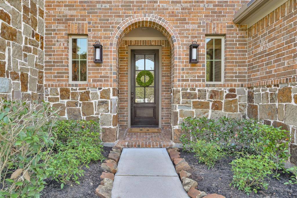 RARE FIND! This beautiful two-story Westin Home, built in 2020, is situated on an unmatched premium 14,000+ sqft greenbelt and cul-de-sac lot in the highly desirable West Village of Grand Central Park.