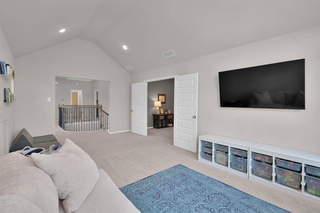 Game room/ play room located on the opposite side of the home as the secondary bedrooms.