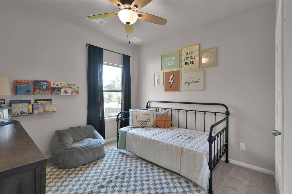 Secondary bedroom #3, located upstairs, features a Jack & Jill style bathroom with secondary bedroom #2.