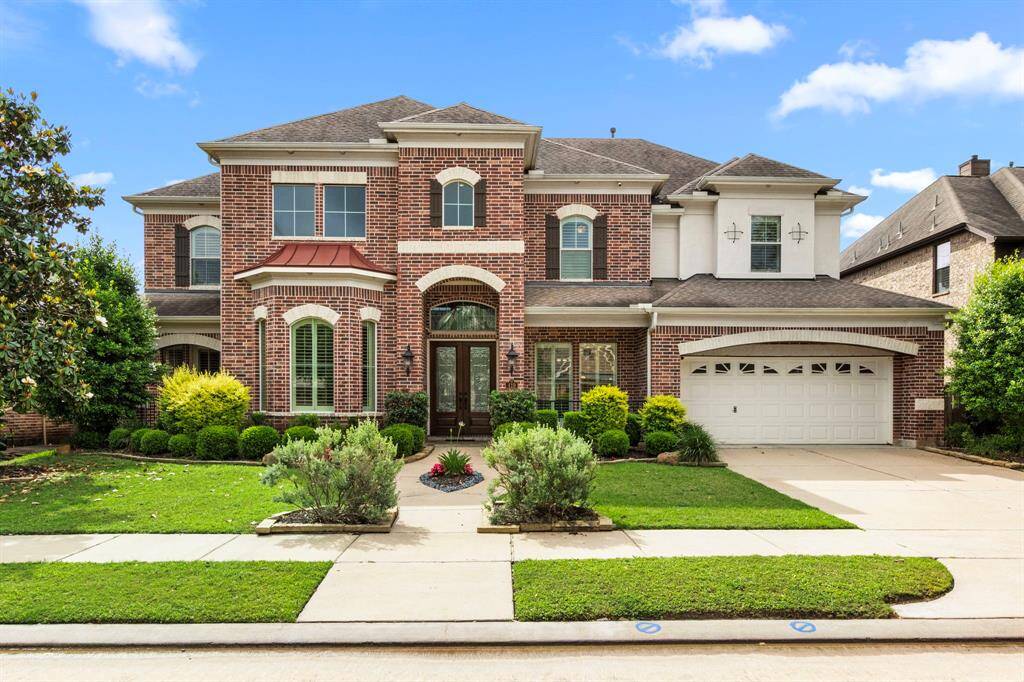 Gorgeous 4/4.5/3, two story home with handsome elevation of brick with stone accents located in the beautiful community of Telfair. This home's stately elegance is apparent with its timeless design features that carry from the exterior through its beautiful interior.