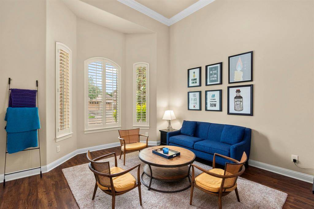 This formal sitting room is located off of the main entry and provides a wonderful space for additional seating and conversation and can easily be used however it would best fit the needs of your family.  Need a music room, an art room, crafts room or maybe a first floor play room?  The room is spacious with high ceilings, crown molding and shuttered windows with front lawn views.