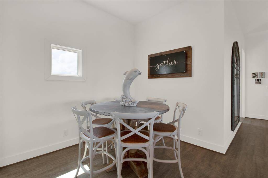 This is a bright, cozy dining nook that allows room for family meals or game nights for all those people who love to make memories!