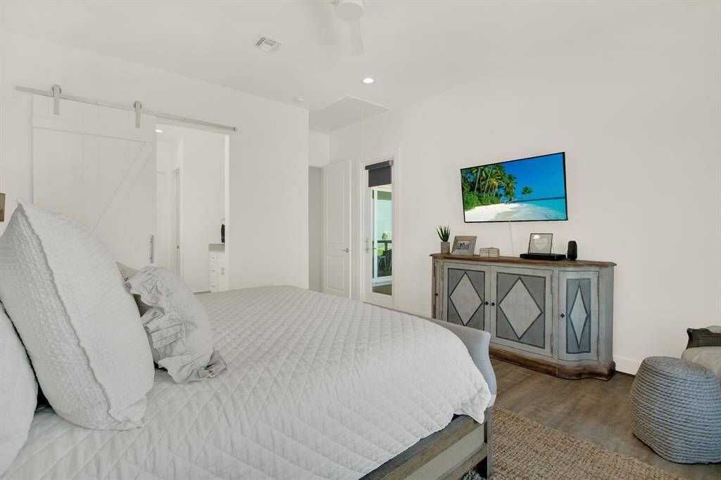 This is room also offers its own entry/exit door to the outdoor covered deck for privacy.