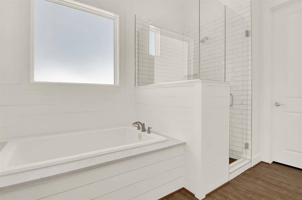 If a long bath is your pleasure- then you're in business!  If a nice hot shower is your pleasure, then we have you covered there too!  This bathroom has it all!