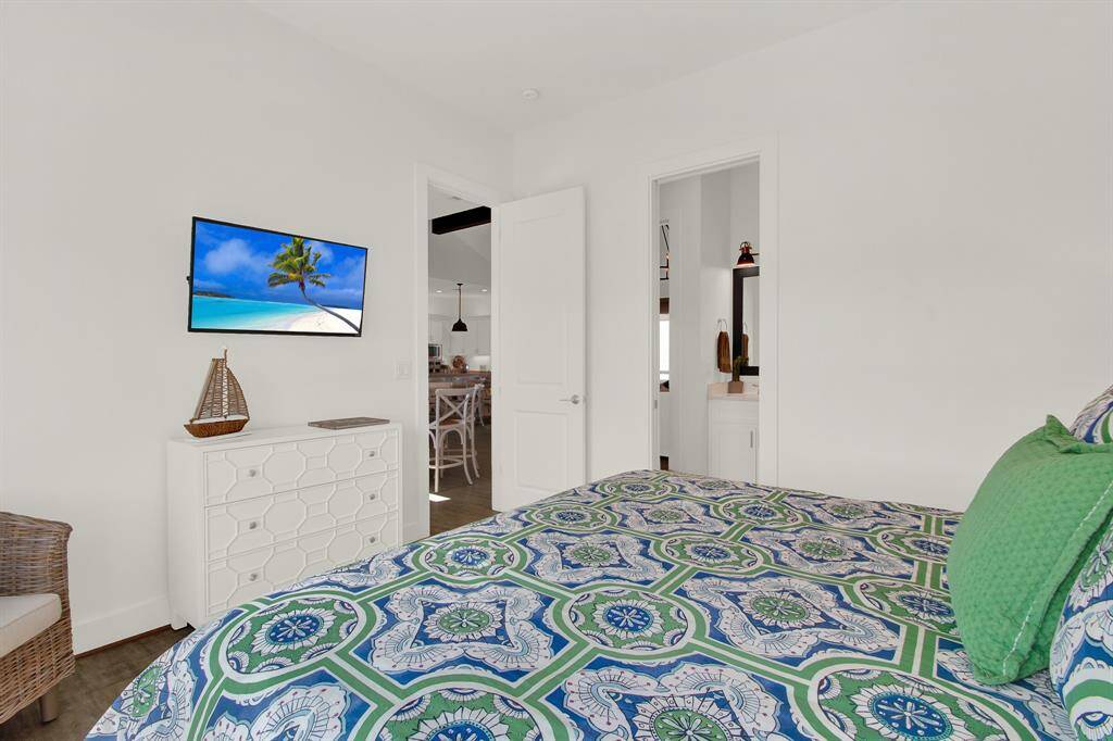 This bright and cozy bedroom is on the second level of the home directly off the living area.