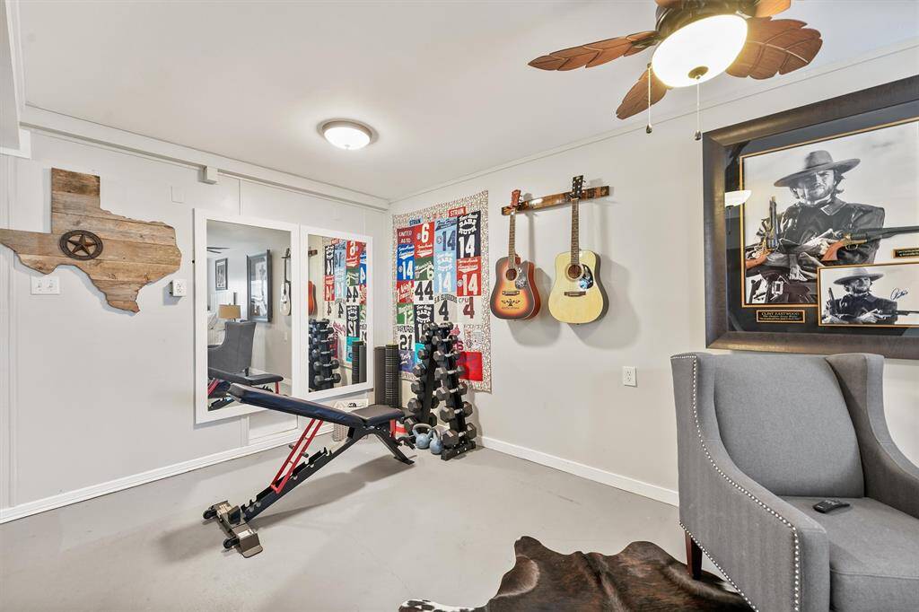 This room is a versatile space and functional area.  This can be a bedroom, a workout room or a mother-in-law quarters.