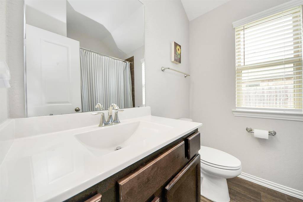 Secondary bathroom is located between bedrooms 1 and 2.