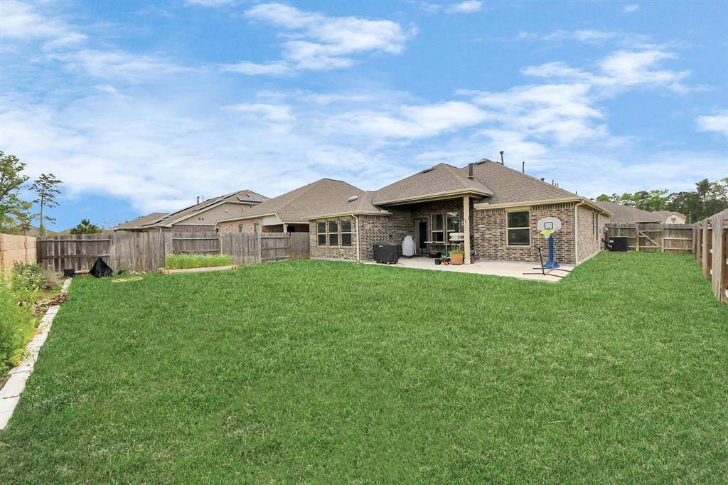 There is plenty of room to play or relax in this yard!!