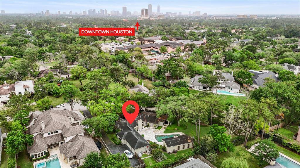 Surrounded by mature trees and upscale neighboring homes, this property offers an exceptional blend of privacy, space, and timeless charm.