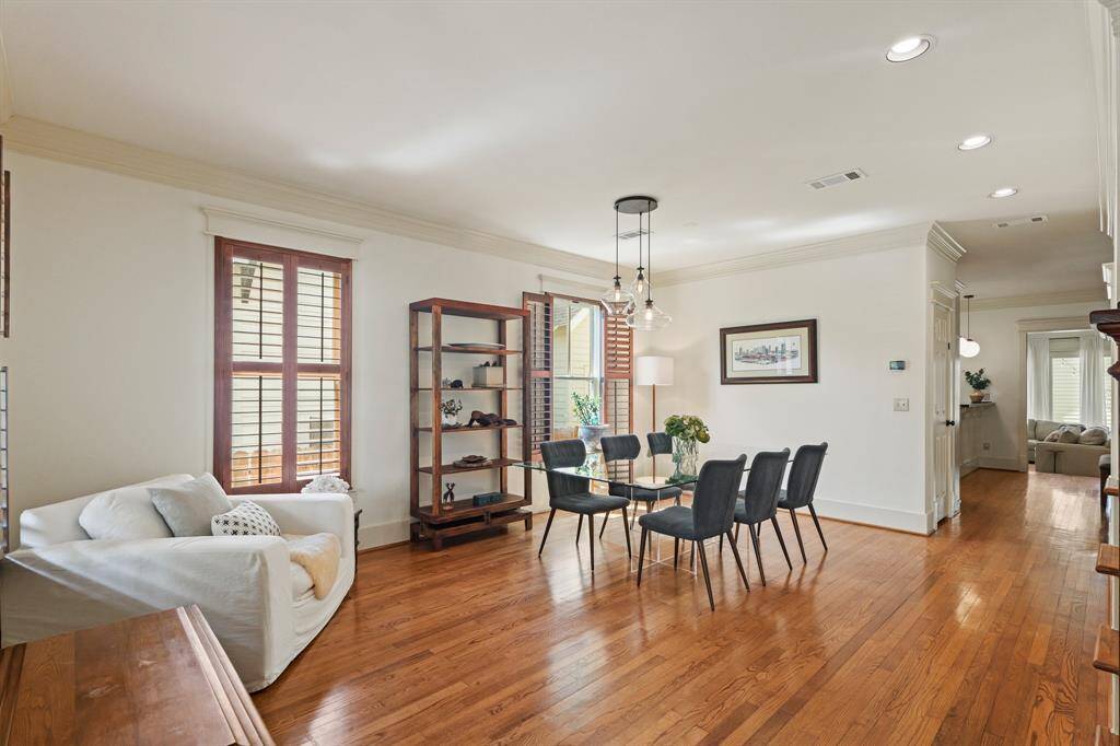 Formal dining room with elegant detailing, ideal for entertaining and featuring a timeless, classic design