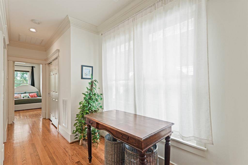 View of hallway leading into the inviting bedroom, offering a seamless flow and ample space