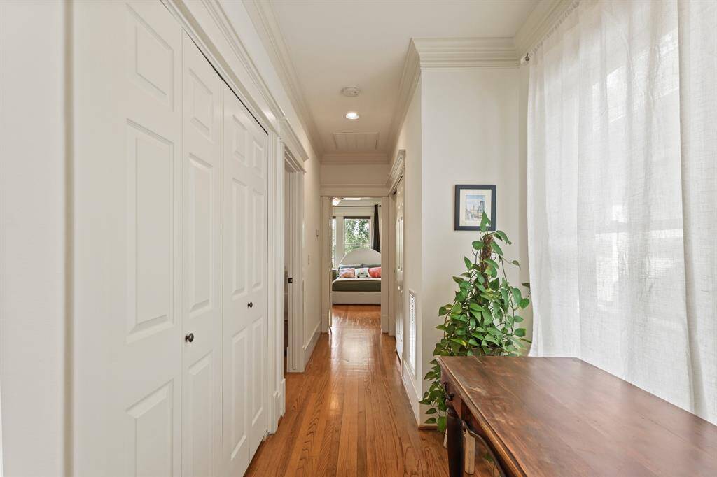 Hallway opening into the bedroom, showcasing a smooth transition and peaceful atmosphere