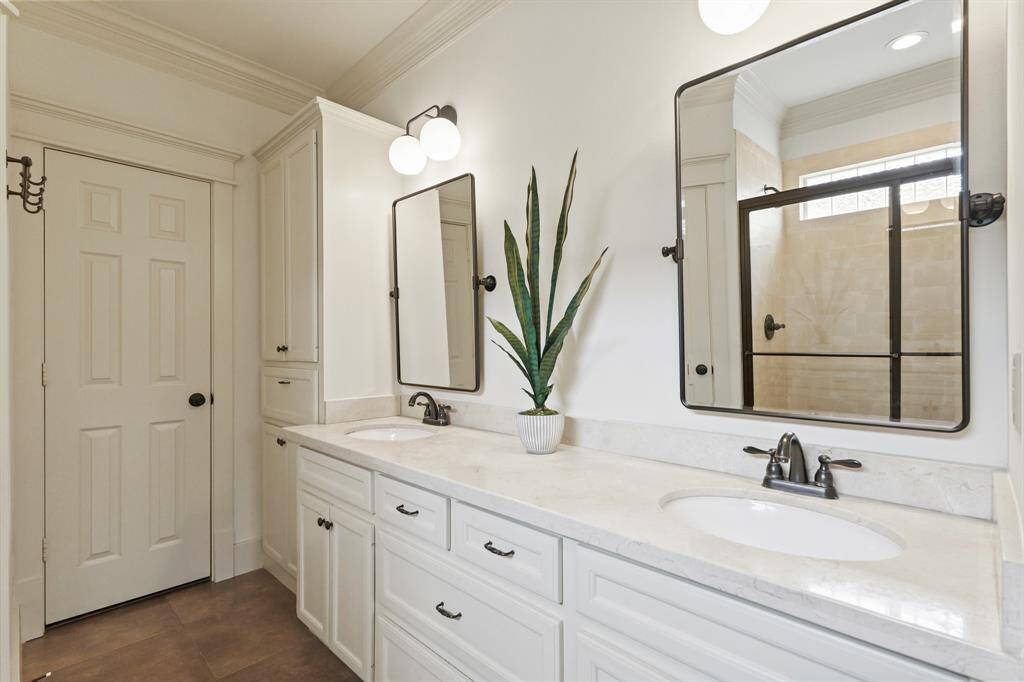 Dual vanity, offering plenty of storage and counter space