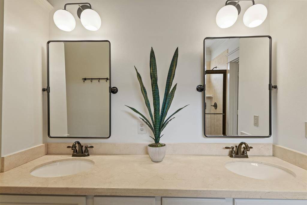 Two separate mirrors, offering a stylish and functional design with ample space for individual use