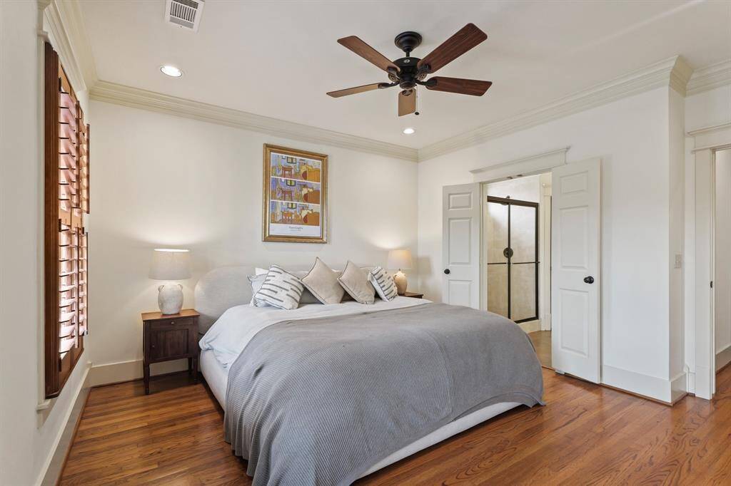 Features include elegant wood floors and a well-designed layout.