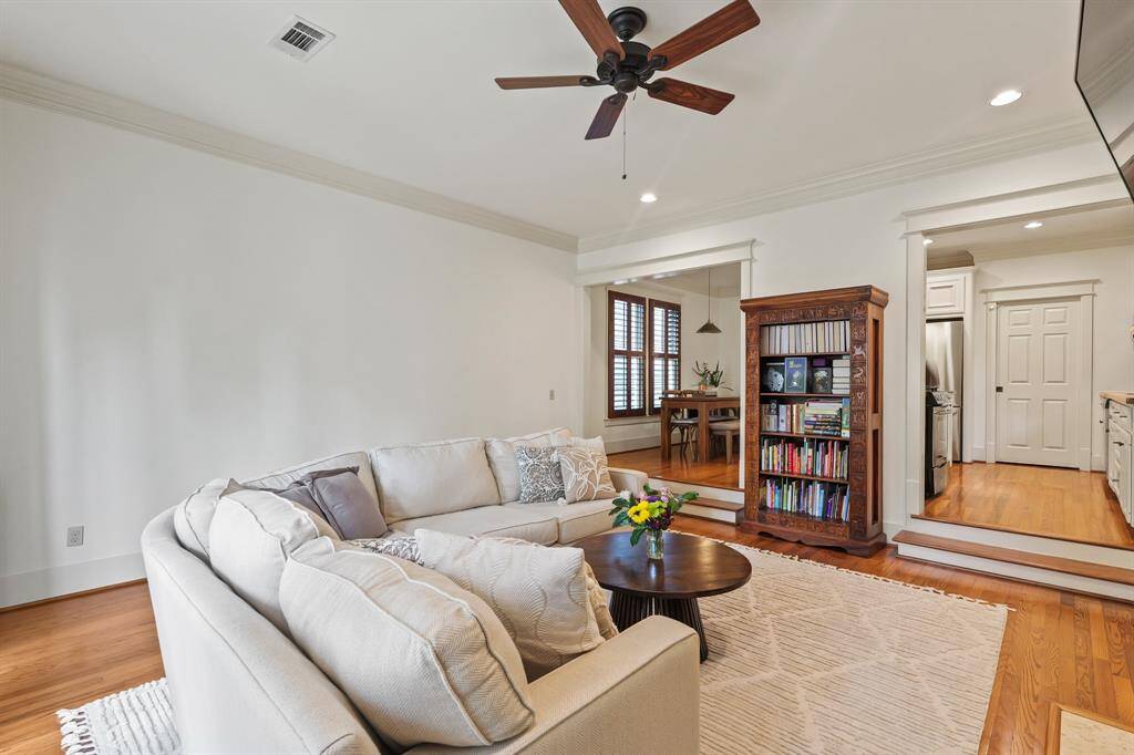 Elegant crown molding throughout, adding a touch of sophistication and detail.