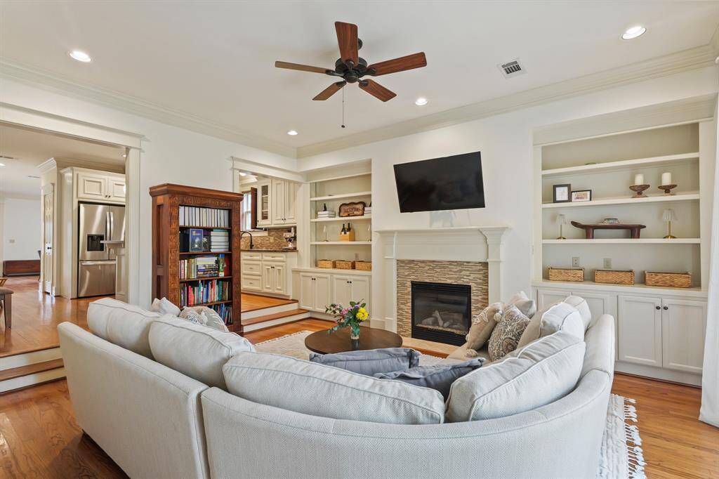 View from the back of the home towards the kitchen, showcasing an open and seamless layout perfect for entertaining.