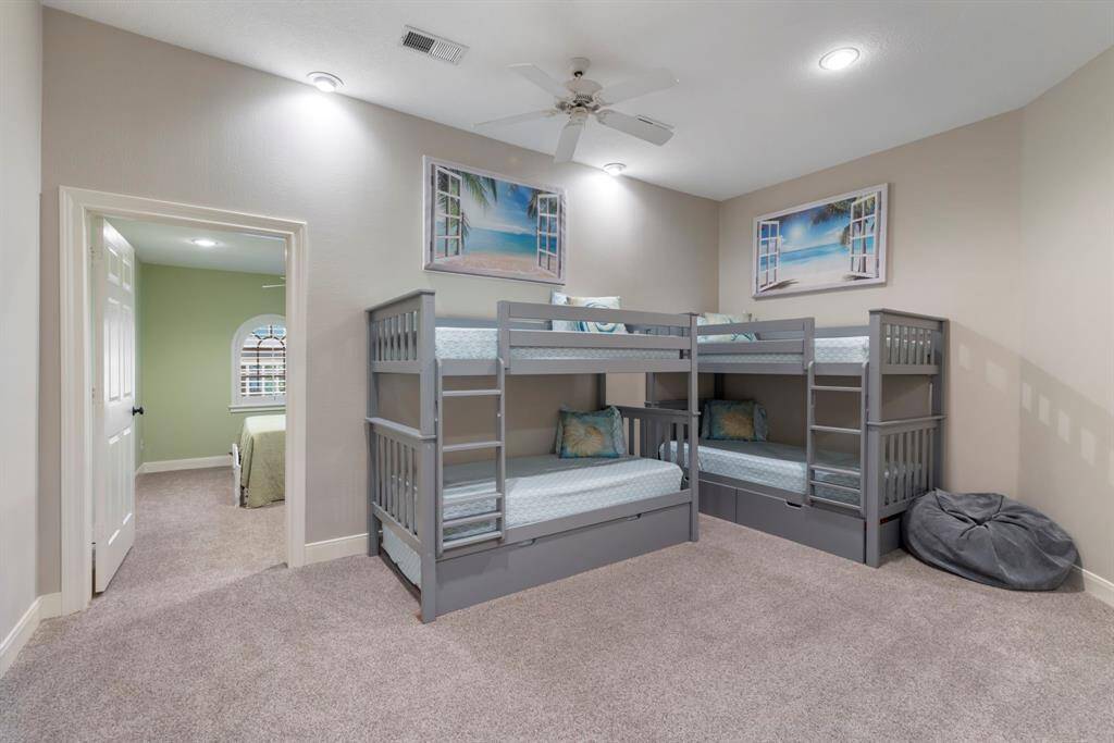 This game room offers a perfect place for creating cherished memories, it provides a delightful escape for kids and the young at heart.