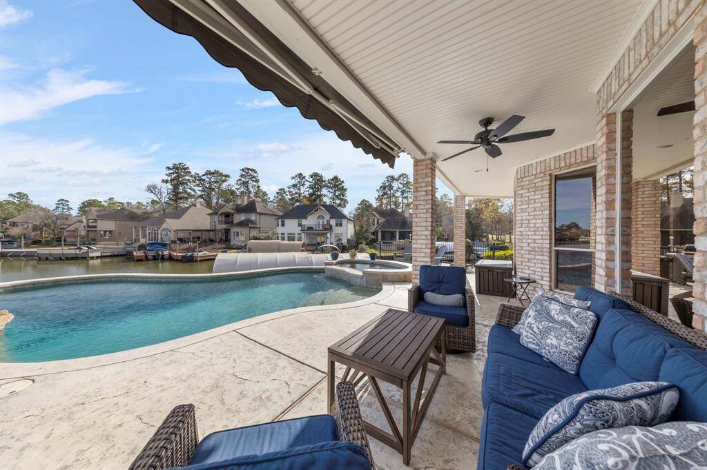 Imagine unwinding on this spacious patio, sipping your favorite drink as you overlook the serene marina cove.