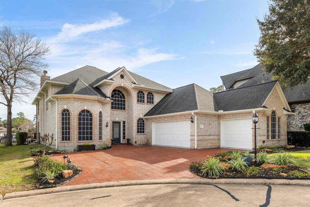 Discover timeless elegance in this stunning two-story home beautifully designed with exquisite brick detail. With its spacious three-car garage and picture-perfect arched windows, this house is more than just curb appeal.