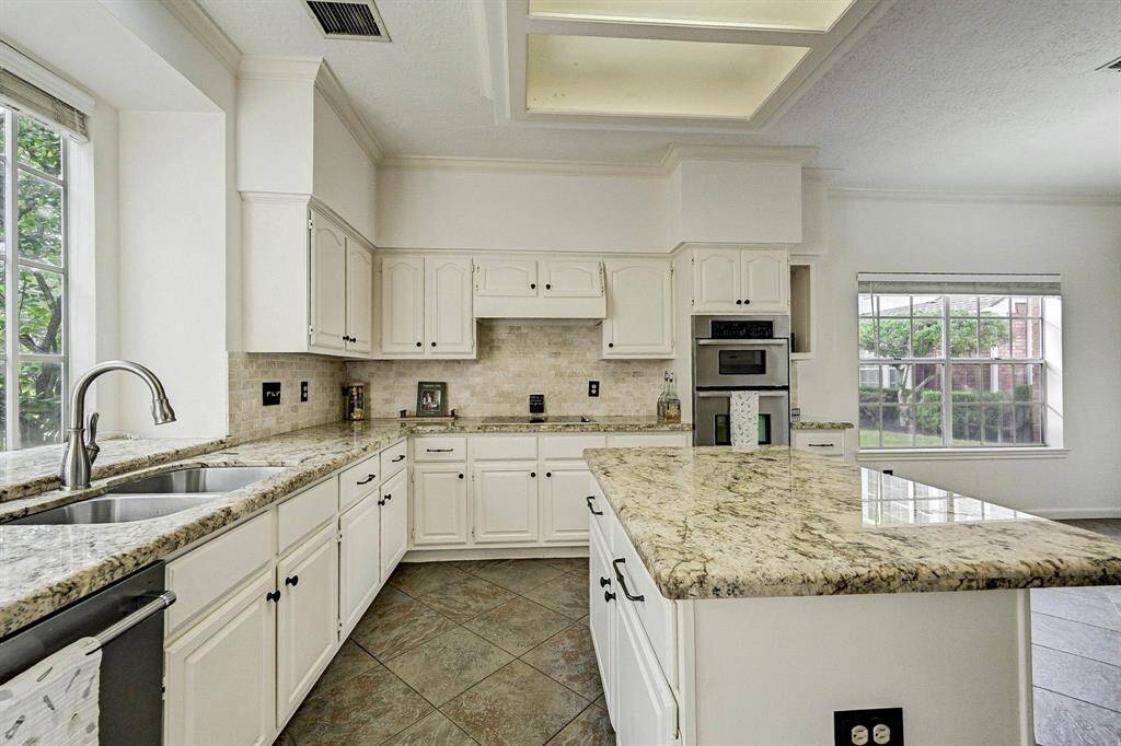 The cooktop is plumbed for gas or electric cooking.