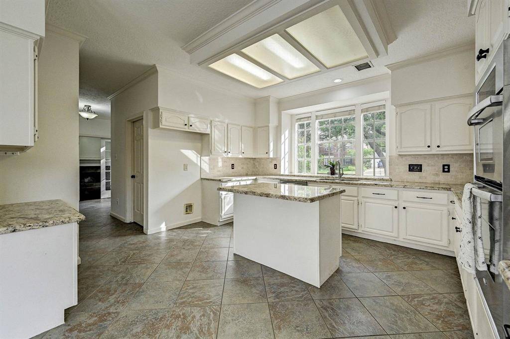 Kitchenn with view into the breakfast room.