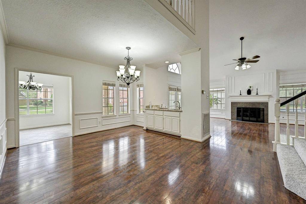 Formal dining with view into living room.
