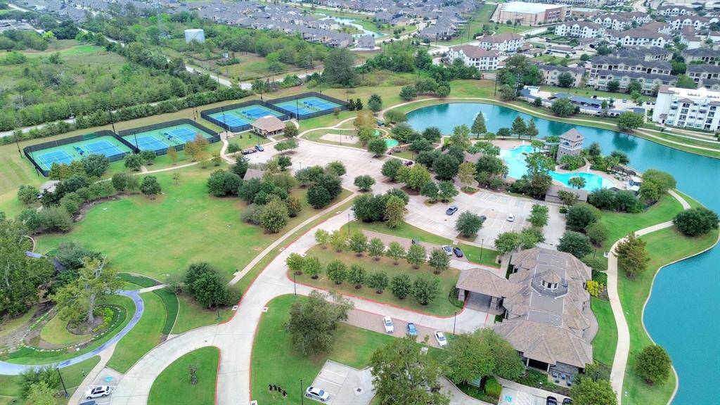 Multiple tennis courts and fitness center located within the community