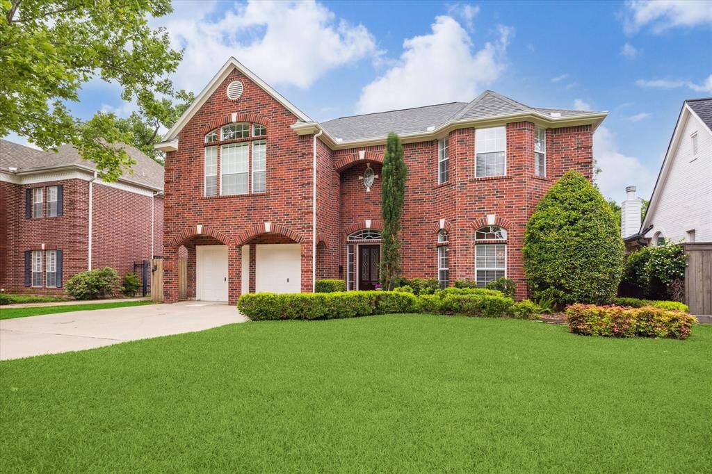 The beautiful brick traditional offers 4-5 bedrooms and a wonderful floorplan, perfect for special entertaining or enjoying everyday living. The two car garage features new epoxy floors!