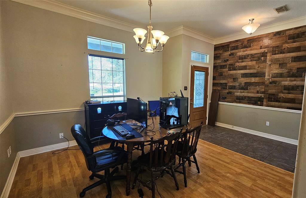 Living Room with Tile Flooring, Built in Entertainment Center and a Fireplace!
