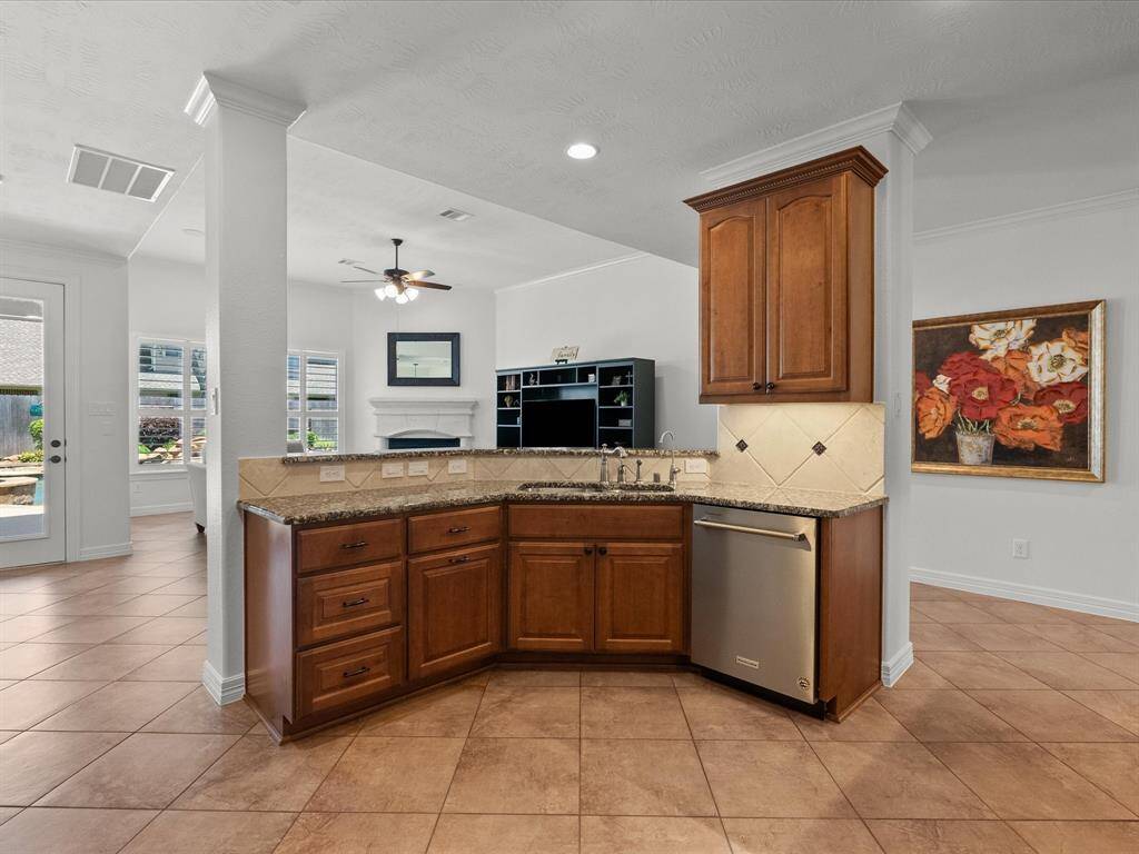 Kitchen - hidden garbage can storage