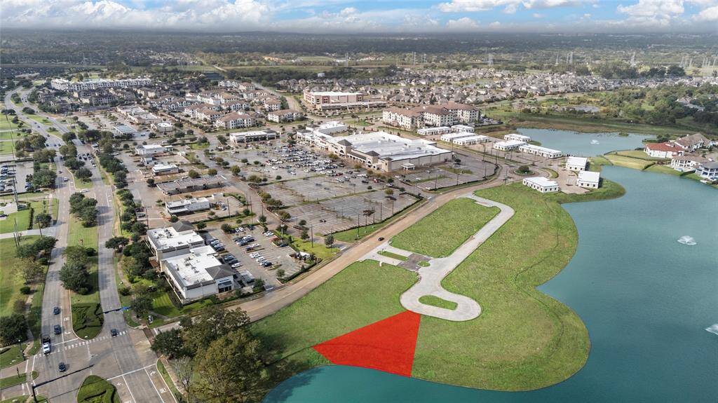 An extraordinary bird's-eye view of this expansive, waterfront cul-de-sac lot in the prestigious Monet Estates of Riverstone. Spanning 10,720 sqft, this prime location offers breathtaking water views, perfect for designing your dream home in this serene, exclusive community.