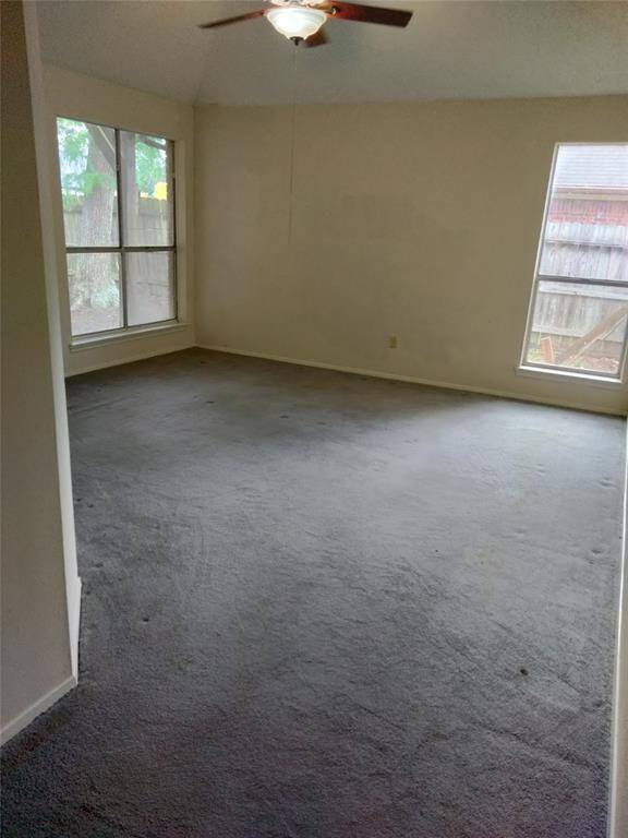 Primary bedroom is downstairs and receives tons of sunlight.