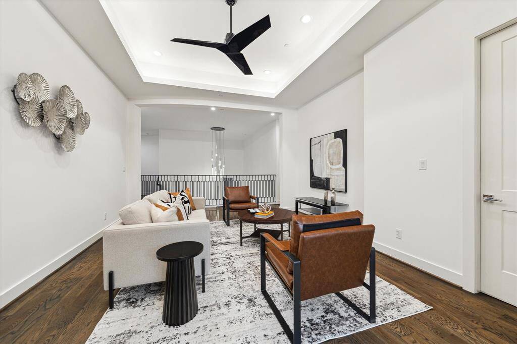 [GAME-ROOM] Nestled on the second level, the game room provides a versatile space for recreation and relaxation. Whether it's movie nights, family game time, or a place for kids to unwind, this bright and airy room is designed to cater to all your entertainment needs.