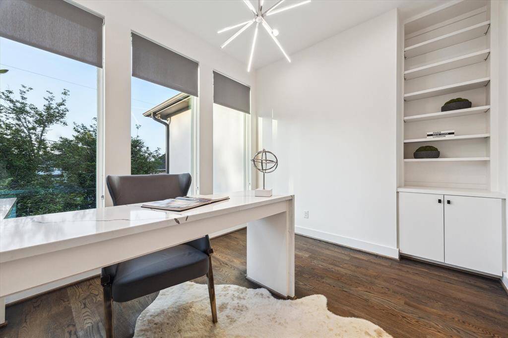 Whether working from home or enjoying a quiet retreat, this versatile space integrates seamlessly with the contemporary style of the home.