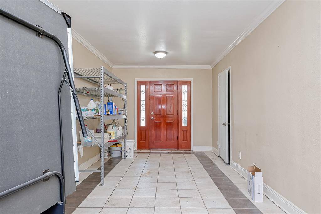 The room that connects the garage to the home.